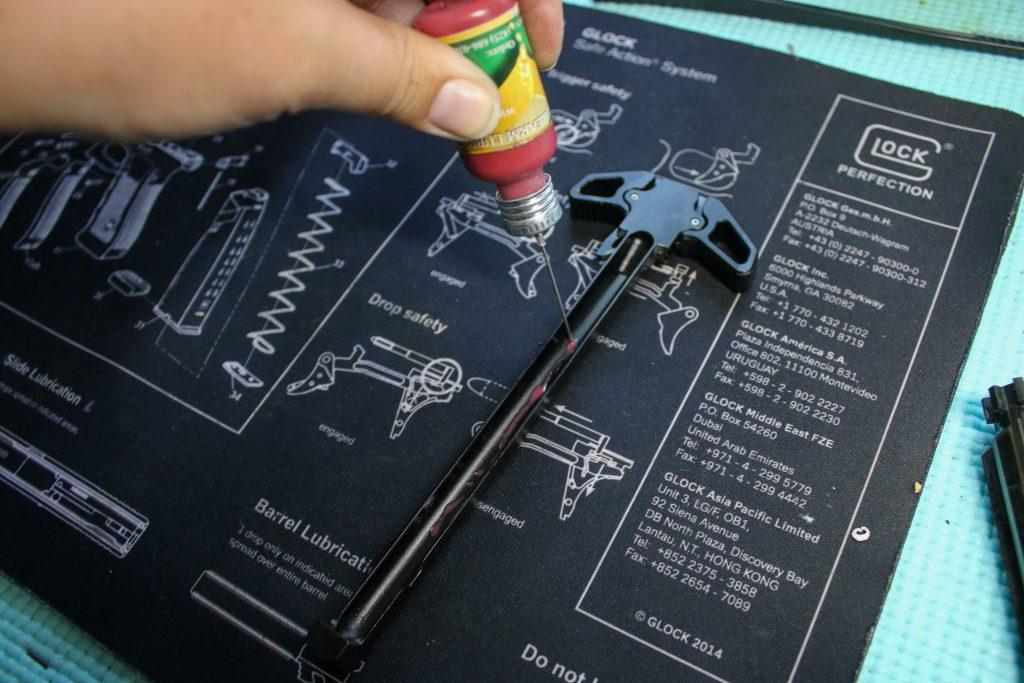 Lubricating a charging handle requires a light touch