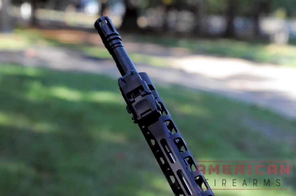 I really appreciated the classic look and feel of the A2 birdcage & nitride-coated, chrome moly vanadium barrel. The 1/7 twist is just right too. Who doesn’t love the classic front sight paired with the M4 cutout? You know, in case you need to mount an M203 grenade launcher.