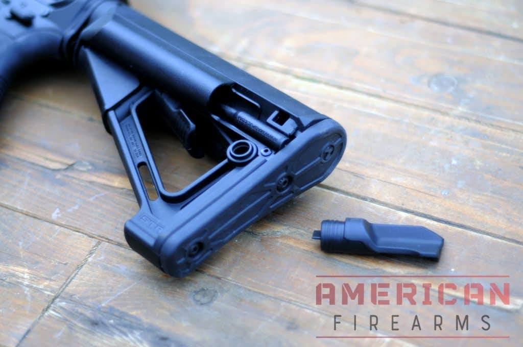 The STR stock has battery storage compartments which are sealed with a rubber plug.