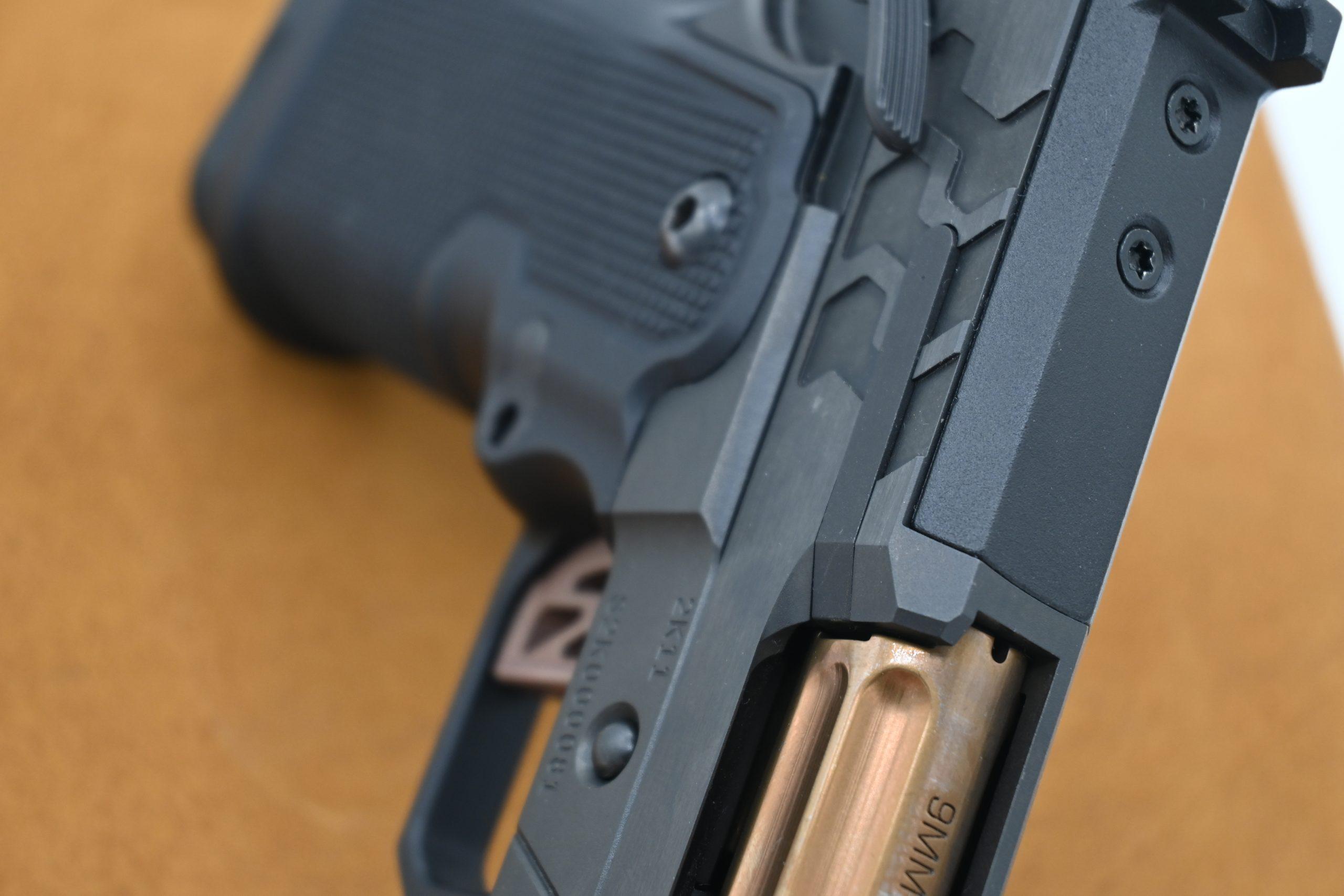 The optics-ready slide accepts RMR-pattern red dots.